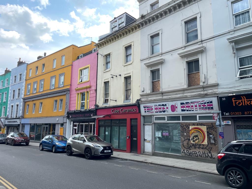 Lot: 172 - FORMER RESTAURANT AND UPPER PARTS WITH POTENTIAL - View down Tontine Street towards Folkestone Harbour